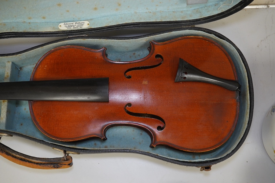 A late 19th century French Chipot-Vuillaume violin, with Edward Withers case, back measures 36cm.